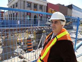 Jason Miller/The Intelligencer
City manger of engineering Ray Ford is pictured here near an excavation at the intersection of Campbell Street and Front Street, where sanitary and storm sewer pipes installed in the 1980s have been deemed to be in good enough condition to not require being replaced.