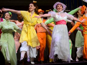 Ashley Kippax, centre, as Mary Poppins, performs with, from left, Danielle Dixon, Amelia Hilton and Justin Eddy in the Beal Musical Theatre production of Mary Poppins. (MORRIS LAMONT, The London Free Press)