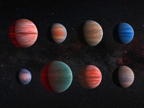 A handout image released by the European Space Agency and Nasa on December 9, 2015 shows an artist's impression of the ten hot Jupiter exoplanets. NASA announced 1,284 new planets orbiting stars outside our solar system, called exoplanets, on Tuesday. Handout/NASA, European Space Agency