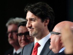 Prime Minister Justin Trudeau is acknowledged by members Canadian Building Trades Union Policy Conference in Ottawa on Tuesday, May 10, 2016. THE CANADIAN PRESS/Fred Chartrand