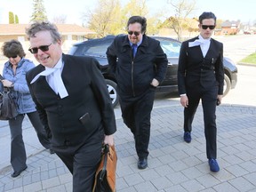 Fred King, second from right in this file photo, pleaded guilty in May in the Superior Court of Justice to nine assaults on four victims over 20 years. The Chatsworth church leader was sentenced today to 18 months jails and two years probation. He's accompanied by his wife, Linda King. Lawyer Paul Mergler leads them into the Owen Sound courthouse, with lawyer Lucas Rebick, far right. ( James Masters/The Owen Sound Sun Times/Postmedia Network)