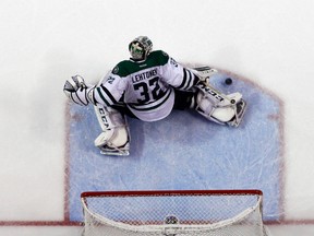 Dallas Stars goalie Kari Lehtonen, of Finland, deflects a puck during the second period of Game 6 of the NHL hockey Stanley Cup Western Conference semifinals against the St. Louis Blues, Monday, May 9, 2016, in St. Louis. (AP Photo/Jeff Roberson)