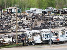 A trailer park damaged by the wildfires is seen in Fort McMurray, Alta., on Monday, May 9, 2016. THE CANADIAN PRESS/Ryan Remiorz