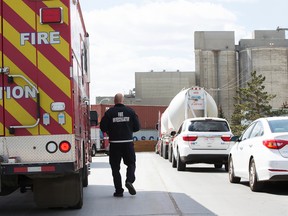 Emergency crews respond to a fire at the Lehigh Hanson Materials Limited cement plant, 12640 Inland Way, in Edmonton Alta. on Tuesday May 10, 2016.