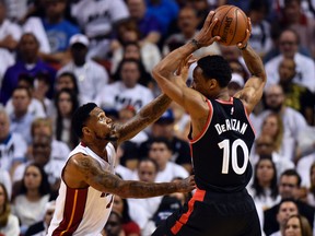 Toronto Raptors guard DeMar DeRozan is pressured by Miami Heat forward Udonis Haslem during the third quarter in Game 3 of the second round of the NBA playoffs at American Airlines Arena in Miami on May 7, 2016. (Steve Mitchell/USA TODAY Sports)