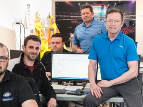 Rogers Place assistant GM Mike McFaul, right, poses with some of his team who will be responsible for back-of-house operations - including, but not limited to, the arena ice surface. From left, Matt Ruptash, Jason Rimmer, Andrew Higgins and Steven Morgan. (Shaughn Butts)