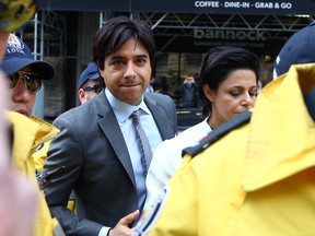 Jian Ghomeshi arrives at Old City Hall in Toronto on May 11, 2016. (Dave Abel/Toronto Sun)