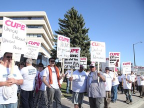 Members of  CUPE local 4705 held an information picket at Tom Davies Square prior to the city council meeting on Tuesday. Gino Donato/Sudbury Star/Postmedia Network