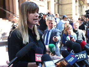 Jian Ghomeshi complainant Kathryn Borel speaks outside Old City Hall Court in Toronto on Wednesday May 11, 2016. (Dave Abel/Toronto Sun)