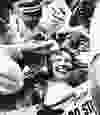 FILE - In this May 28, 1978 file photo, Janet Guthrie is all smiles as her pit crew swarms around her following the 62nd running of the Indianapolis 500 auto race in Indianapolis, Ind. Guthrie became first woman ever to finish in the Memorial Day Classic. (AP Photo/File)