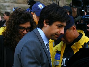 Jian Ghomeshi leaves at Old City Hall in Toronto on Wednesday, May 11, 2016. (Dave Abel/Toronto Sun)