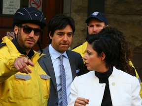 Jian Ghomeshi and lawyer Marie Henein leave Old City Hall in Toronto on Wednesday, May 11, 2016. (Dave Abel/Toronto Sun)