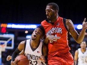 Tyshawn Patterson of the London Lightning uses his head to try and push off Windsor's Chris Commos to make some room to take a shot during their Sunday afternoon game at Budweiser Gardens in London. (File photo)