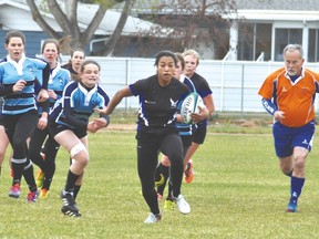 John Seaman, pictured here refereeing a recent County Central High School senior girls' rugby game, was recently named this year's recipient of the Ron Pelham Award for all his volunteer work over the years. Stephen Tipper Vulcan Advocate