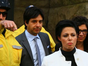 Jian Ghomeshi leaves at Old City Hall Courts in Toronto on Wednesday May 11, 2016. Dave Abel/Toronto Sun/Postmedia Network