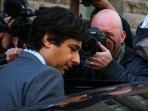Jian Ghomeshi leaves at Old City Hall in Toronto on Wednesday May 11, 2016. (Dave Abel/Toronto Sun)