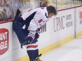 Washington Capitals forward Alex Ovechkin leans against the boards before the start of Game 3 against the Pittsburgh Penguins in an NHL playoff series in Pittsburgh on May 2, 2016. (AP Photo/Gene J. Puskar)