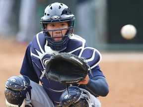 Winnipeg Goldeyes catcher Carlton Tanabe catches the ball prior to playing the FargoMoorhead Redhawks in American Association baseball in Winnipeg, Man. Tuesday May 10, 2016.
Brian Donogh/Winnipeg Sun/Postmedia Network