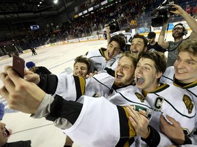 London Knights players pose for a selfie with goaltender Brendan Burke after winning the OHL Championship Series by beating the Niagara Ice Dogs 1-0 to sweep the series at the Meridian Centre in St. Catharines, Ont. on Wednesday May 11, 2016. Craig Glover/The London Free Press/Postmedia Network