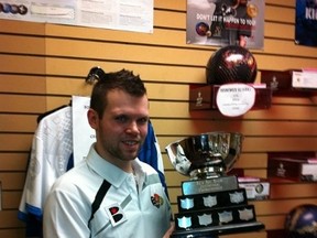 Matt Dammann with the Ed's Invittational trophy at Ed's Rec Centre in West Edmonton Mall, where he mans the pro shop. Dammann has bowled five perfect games this season. (Supplied)
