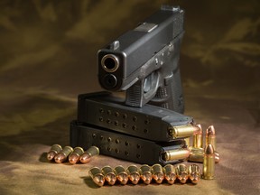 Handgun with ammo - Getty images - Sudbury