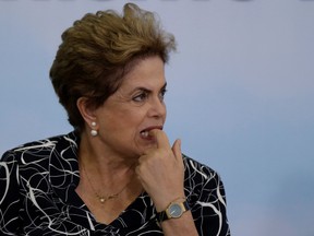 Brazil's President Dilma Rousseff attends a signing ceremony for new housing units of the Minha Casa Minha Vida at the Planalto Palace in Brasilia, Brazil, in this May 6, 2016 file photo. Brazil's Senate voted May 12, 2016, to impeach President Dilma Rousseff after a months-long fight that laid raw the country's fury over corruption and economic decay. (REUTERS/Ueslei Marcelino/File Photo)