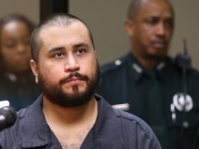 In this Tuesday, Nov. 19, 2013, file photo, George Zimmerman, acquitted in the high-profile killing of unarmed black teenager Trayvon Martin, listens in court, in Sanford, Fla., during his hearing. (AP Photo/Orlando Sentinel, Joe Burbank, Pool, File)