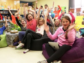 Teacher Deborah Lumley and her Grade 5 Rosedale Public School class celebrate winning a $3,000 prize in this year's Classroom Energy Diet Challenge. The Shell and Canadian Geographic-sponsored competition encourages energy efficiency. (Tyler Kula, The Observer)