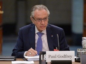 Postmedia president and CEO Paul Godfrey, appears at commons heritage committee on Parliament Hill in Ottawa on Thursday, May 12, 2016, to discuss the media and local communities. THE CANADIAN PRESS/Sean Kilpatrick