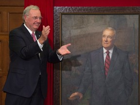 Former prime minister Paul Martin applauds after his official portrait was unveiled during a ceremony on Parliament Hill in Ottawa, Wednesday May 11, 2016. THE CANADIAN PRESS