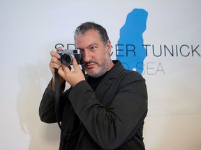 U.S. art photographer Spencer Tunick uses a camera during a press conference on Sept.14, 2011 in Tel Aviv, Israel. (Uriel Sinai/Getty Images)