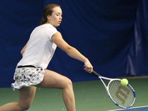 Gracen Lacko, of Lo-Ellen Park Secondary School, competes in the girls tennis singles finals at the Sudbury Indoor Tennis Centre in Sudbury, Ont. on Thursday May 12, 2016. John Lappa/Sudbury Star/Postmedia Network