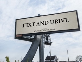 A billboard with an interesting message for drivers on the Gardiner Expy. (wathanfuneral.com)