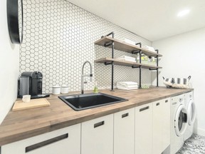 Gas piping and wood shelving suffuse the laundry room with a whisper of the perennially popular ?industrial? vibe.