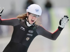 Canada's Ivanie Blondin reacts after winning the women's mass start race of the speedskating single distance world championship in Kolomna, Russia, on Sunday, Feb. 14, 2016. (Ivan Sekretarev/AP Photo)