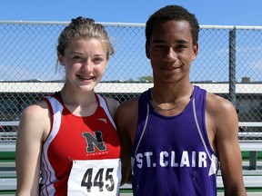 Lauren Perkins, left, of Northern and Michael Pugsley of St. Clair were chosen the athletes of the meet at the LKSSAA track and field championship at the Chatham-Kent Community Athletic Complex in Chatham, Ont., on Wednesday, May 11, 2016. Mark Malone/Chatham Daily News/Postmedia Network