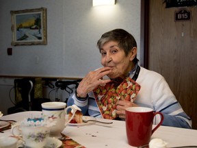 Darlene Hawryliw enjoys some of the whipping cream on her strawberry short cake at the Strawberry Tea event held at St. Michael’s Grove Manor in Spruce Grove on Friday, May 6, 2016.  - Photo by Yasmin Mayne