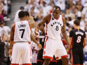 Toronto Raptors centre Bismack Biyombo (right) and his teammates beat the Heat in Game 5 of their NBA playoff series at the Air Canada Centre in Toronto on May 11, 2016. (Stan Behal/Toronto Sun)