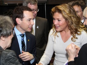 Keynote speaker Sophie Grégoire-Trudeau, seen being introduced to Yolaine Munter by her son, Alex Munter, stuck around to mix and mingle during the 20th anniverary celebration and fundraiser for Debra Dynes Family House, held at Ottawa City Hall on Wednesday, April 6, 2016. (Caroline Phillips/Ottawa Cititzen)