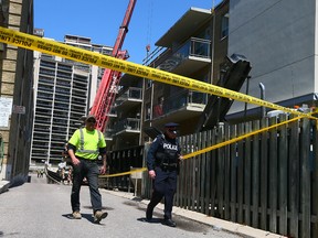 Toronto Police on scene near Broadview and Redpath after a 28-year-old man fell four storeys on Friday, May 13, 2016. Dave Abel/Toronto Sun/Postmedia Network