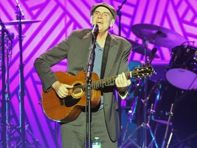 James Taylor performs at the Rogers K-Rock Centre in Kingston on Thursday. (Steph Crosier/The Whig-Standard)