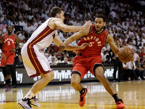 Toronto Raptors' Cory Joseph tries to get around Miami Heat's Goran Dragic during the first half of Game 6 of the NBA Eastern Conference semifinals at the Air Canada Centre in Toronto on May 13, 2016. (AP Photo/Alan Diaz)