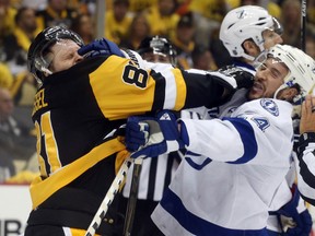 Pittsburgh Penguins right winger Phil Kessel and Tampa Bay Lightning right winger Ryan Callahan  tussle during Game 1 of the NHL's Eastern Conference Final at the CONSOL Energy Center in Pittsburgh on May 13, 2016. (Charles LeClaire/USA TODAY Sports)