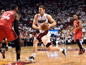 Miami Heat guard Goran Dragic (7) prepares to shoot the ball in front of Toronto Raptors forward Patrick Patterson (54) during the third quarter in game six of the second round of the NBA Playoffs at American Airlines Arena. Steve Mitchell-USA TODAY Sports