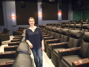 Lisa Laurin, theatre manager of the Downtown Movie Lounge located at the Rainbow Centre in Sudbury, Ont., shows off one of six theatres on Friday May 13, 2016. John Lappa/Sudbury Star/Postmedia Network