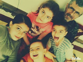Sharvahn Azer, clockwise from top left, Rojevahn Azer, Saren Azer, Dersim Azer and Meitan Azer pose in this undated handout photo from Facebook community page. The mother of four Vancouver Island siblings says photographs posted online of them and their fugitive father could be a break in the case. A Canada-wide warrant remains in place for Saren Azer, a well-known Canadian doctor of Iranian descent, for alleged abduction in contravention of a custody order. (THE CANADIAN PRESS/HO - Facebook)