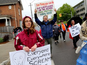 Members of the Quinte Biosphere Defenders make their way down Pinnacle Street as part of a climate action march held on Saturday May 14, 2016 in Belleville, Ont. 

Emily Mountney-Lessard/Belleville Intelligencer/Postmedia Network