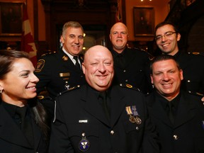 The Ottawa Paramedic Services Team twas honoured for their work the morning of the terrorist attack on Ottawa that killed Corporal Nathan Cirillo, as Ontario recognizes outstanding bravery of paramedics at a ceremony at Queens Park in Toronto  on Thursday May 12, 2016. (Paramedic Michael Call missing) Stan Behal/Toronto Sun/Postmedia Network