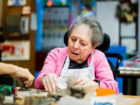 Joan Goldstein-Dresher, a client at Baycrest Health Sciences, works on crafts at the Donald & Elaine Rafelman Creative Arts Studio at Baycrest Health Sciences in Toronto, Ont. on Wednesday April 27, 2016. Ernest Doroszuk/Toronto Sun/Postmedia Network