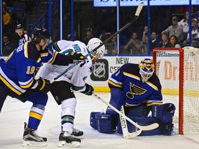 St. Louis Blues goalie Brian Elliott makes a save on San Jose Sharks centre Joe Pavelski at Scottrade Center during the regular season. (Jeff Curry/USA TODAY Sports)